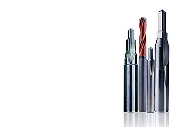 Strumenti di perforazione a gradini