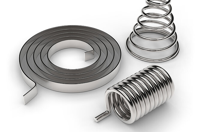 Molle - Pezzi metallici che possono essere deformati elasticamente, ad esempio molle elicoidali.